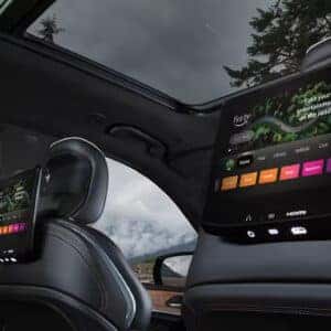 Rear seat entertainment system with Amazon Fire TV in the 2025 Jeep Grand Cherokee, featuring dual screens.