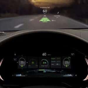 Head-up display showcasing speed, navigation, and incoming call notifications in the 2025 Jeep Grand Cherokee.