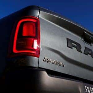 2025 ram 2500 rebel showcasing the tailgate with rebel, ram, and 4x4 emblems on the tailgate