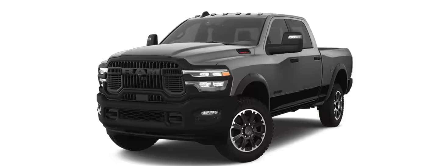 The 2025 Ram 2500 Rebel in Granit Crystal Metallic Clear Coat exterior paint with a Diamond Black Crystal Pearl Coat roof.