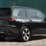 2020 Mercedes-Benz GLS parked by lake price banner