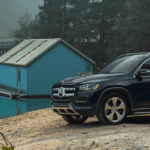 2020 Mercedes GLS suv near lake with cabin
