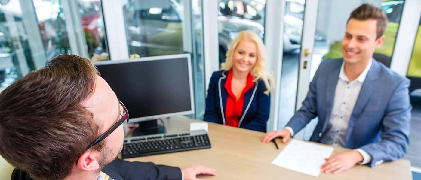 Couple Financing A Car At A Dealership Depositphotos 139232272 Xl 2015 