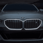 a 2026 BMW i5 in a garage.