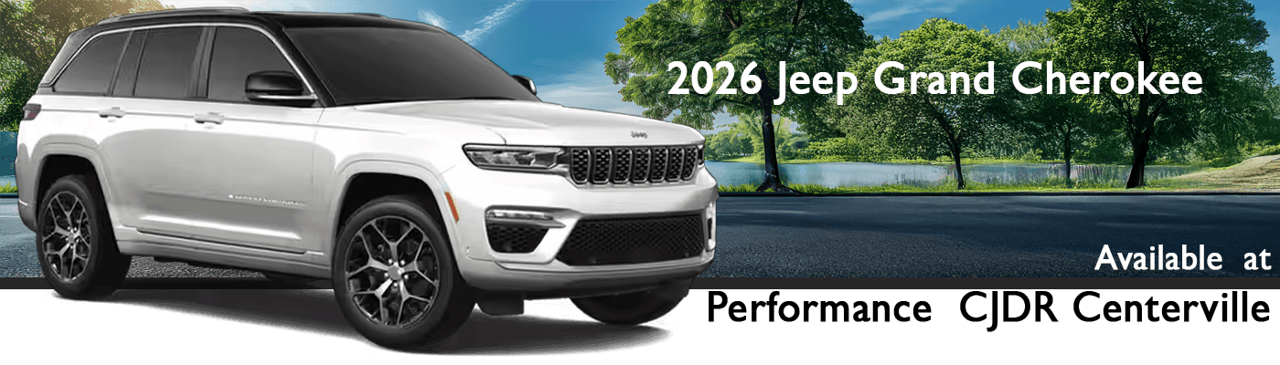 2026 Jeep Grand Cherokee driving through a scenic Ohio landscape