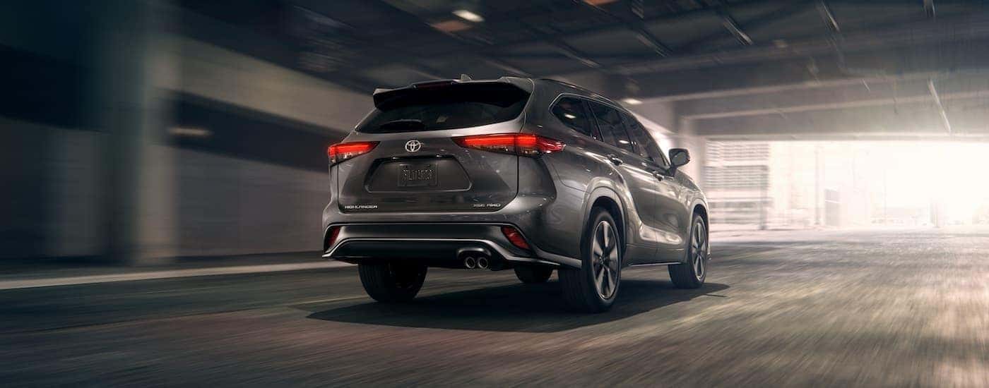 A grey 2022 Toyota Highlander XSE is shown in a tunnel after visiting a Toyota Highlander dealer.