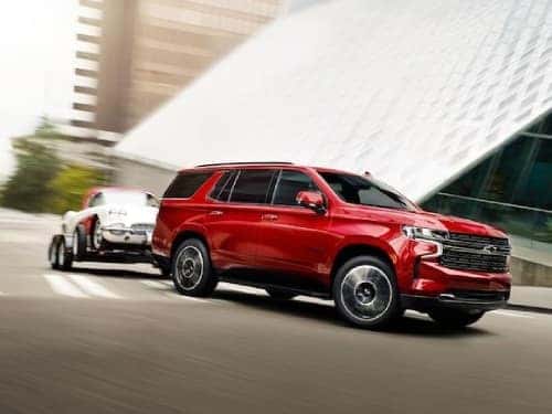 2024 Chevy Tahoe towing a small car