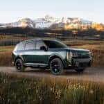 2027 Kia Telluride with mountains in background