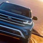 2022 VW Atlas driving up a hill