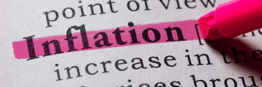 the word inflation on a piece of paper