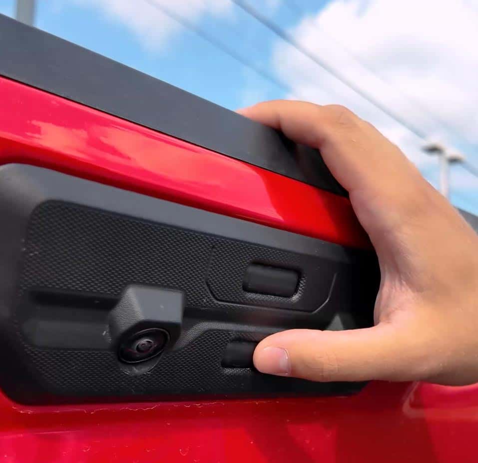 Close-up of the Multi-Flex Tailgate control touchpad on a Chevy Silverado